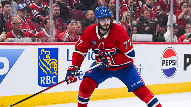 MONTREAL, QC - MAY 25: Montreal Canadiens center Kirby Dach (77) considers his options with the puck during game three of the NHL Stanley Cup Playoffs Eastern Conference Final between the Carolina Hurricanes and the Montreal Canadiens on May 25, 2026, at Bell Centre in Montreal, QC