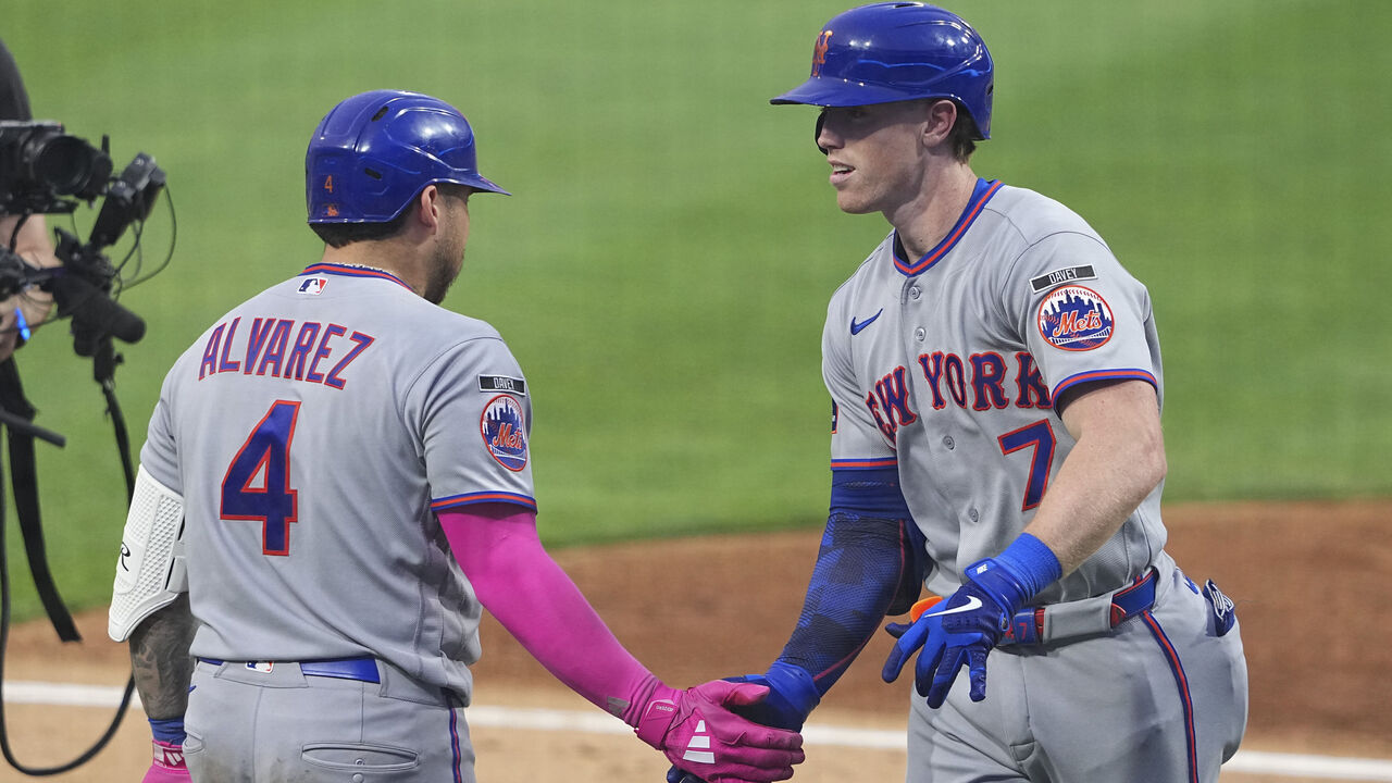 PHILADELPHIA, PENNSYLVANIA - JULY 16: Brett Baty #7 of the New York Mets celebrates with Francisco Alvarez #4 after hitting a solo home run in the top of the seventh inning against the Philadelphia Phillies at Citizens Bank Park on July 16, 2026 in Philadelphia, Pennsylvania. The Mets defeated the Phillies 4-1.