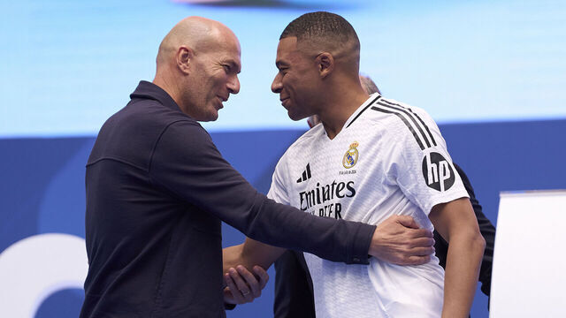 MADRID, SPAIN - JULY 16: Real Madrid new signing, Kylian Mbappe salutes Zinedine Zidane during his unveiling at Estadio Santiago Bernabeu on July 16, 2024 in Madrid, Spain.