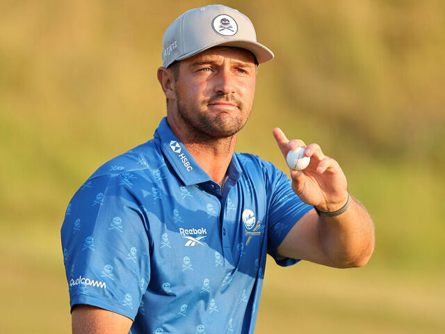 Bryson roars into 2nd behind record-tying Herbert