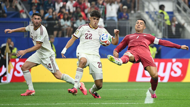ARLINGTON, TEXAS - JULY 06: Cristiano Ronaldo #7 of Portugal competes for the ball against Pau Cubarsi #22 and Aymeric Laporte #14 of Spain during the FIFA World Cup 2026 Round of 16 match between Portugal and Spain at Dallas Stadium on July 06, 2026 in Arlington, Texas.