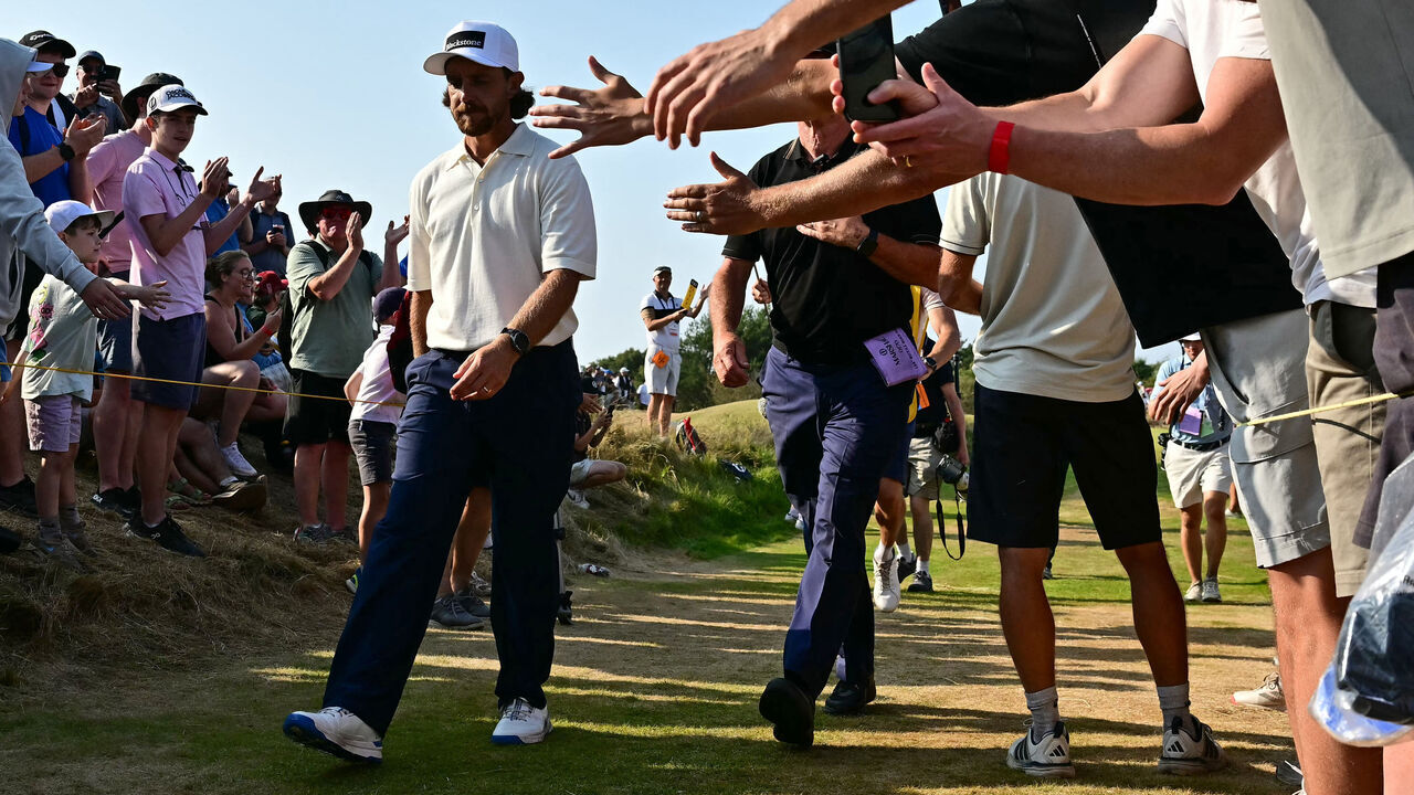 England's Tommy Fleetwood walks to the 15th tee on day three of the 154th Open Golf championship at Royal Birkdale Golf Club near Southport in north-west England on July 18, 2026. / RESTRICTED TO EDITORIAL USE