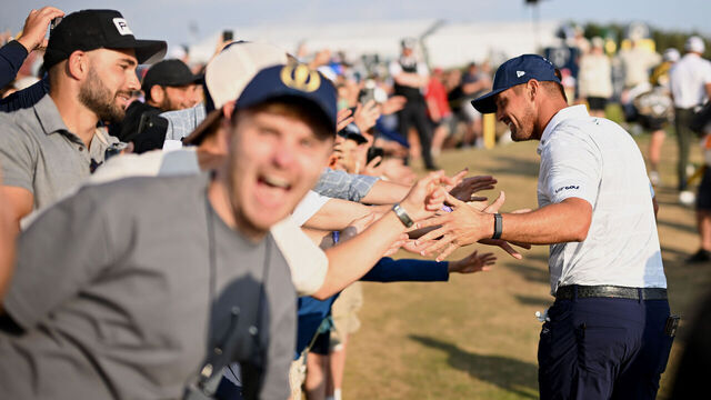 SOUTHPORT, ENGLAND - JULY 18: Bryson DeChambeau of the United States greets spectators during Day Three of the The 154th Open Championship at Royal Birkdale on July 18, 2026 in Southport, England.