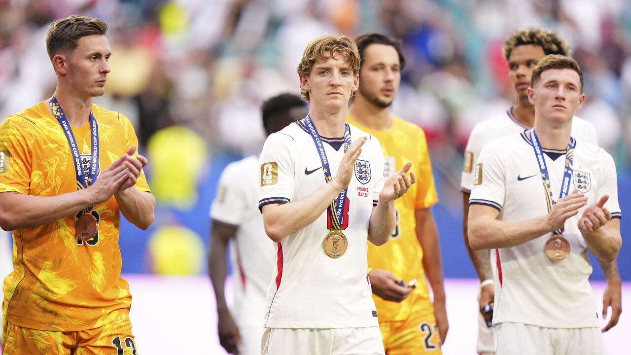 MIAMI GARDENS, FLORIDA - JULY 18: Anthony Gordon (C) of England celebrates the victory wearing the third place medal during the FIFA World Cup 2026 Bronze Medal Match match between France and England at Miami Stadium on July 18, 2026 in Miami Gardens, Florida.