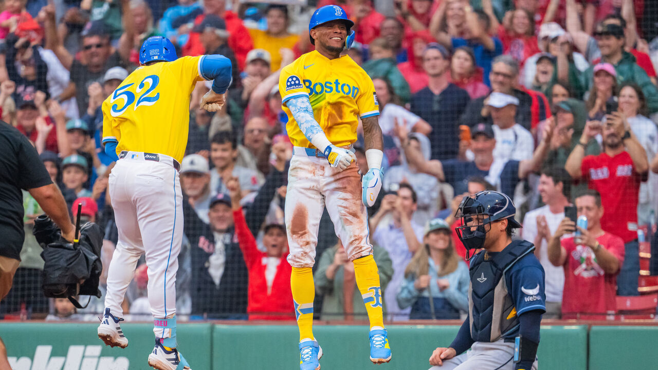 BOSTON, MASSACHUSETTS - JULY 18: Wilyer Abreu #52 and Ceddanne Rafaela #3 of the Boston Red Sox celebrate after taking the lead against the Tampa Bay Rays in the bottom of the seventh inning at Fenway Park on July 18, 2026 in Boston, Massachusetts.