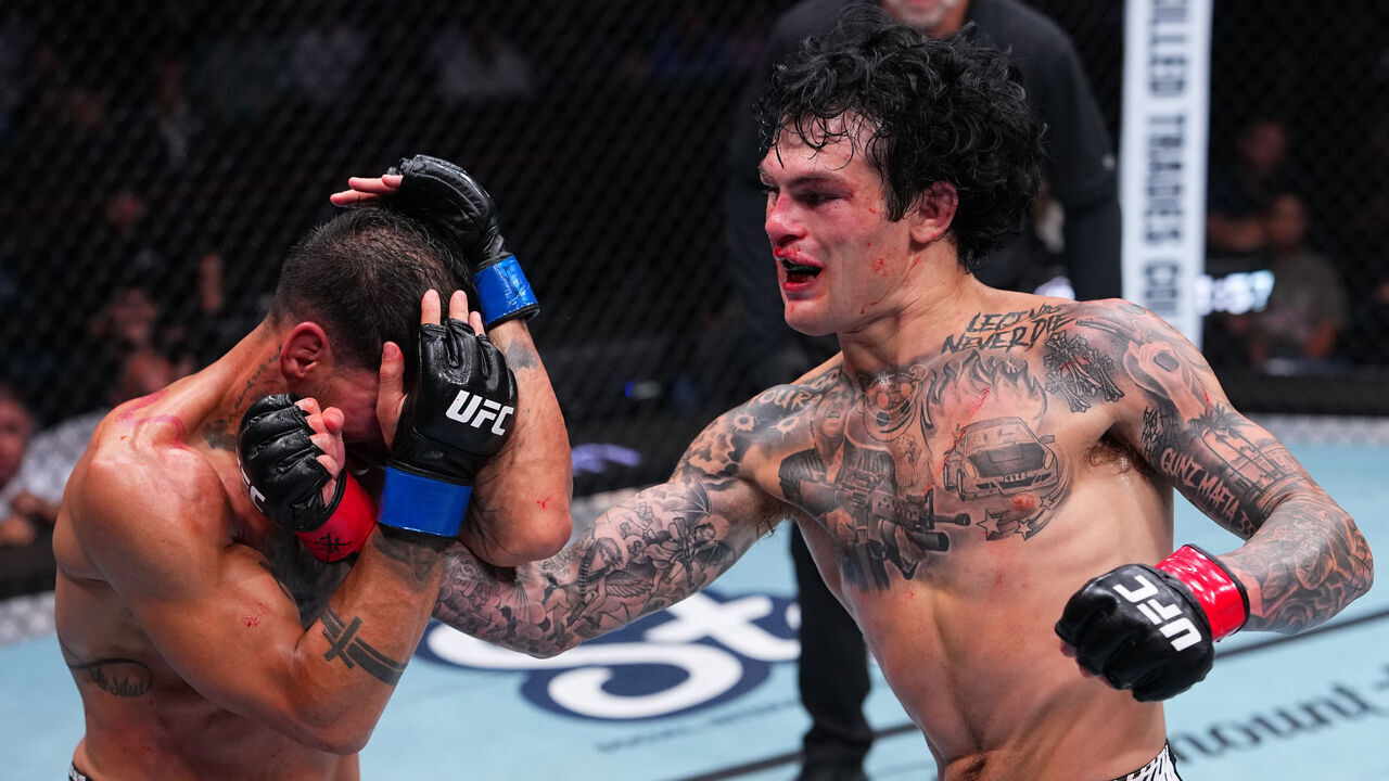 OKLAHOMA CITY, OKLAHOMA - JULY 18: (R-L) Tommy McMillen punches Alberto Montes of Venezuela in a featherweight fight during the UFC Fight Night event at Paycom Center on July 18, 2026 in Oklahoma City, Oklahoma.
