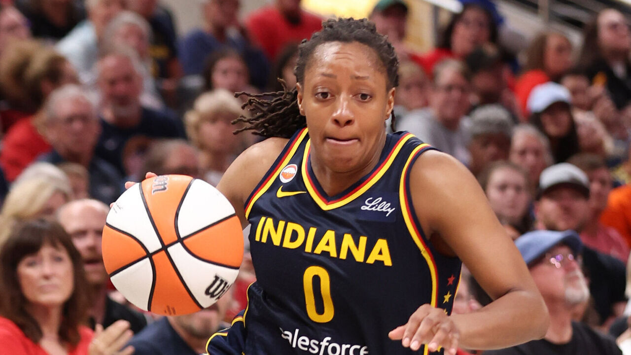 INDIANAPOLIS, IN - JULY 18: Kelsey Mitchell #0 of the Indiana Fever dribbles the ball during the game against the New York Liberty on July 18, 2026 at the Gainbridge Fieldhouse in Indianapolis, Indiana. Mandatory Copyright Notice: Copyright 2026 NBAE