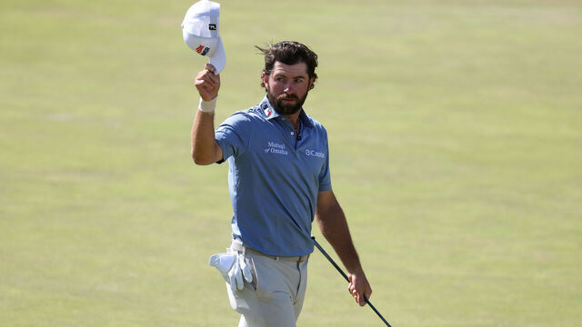 SOUTHPORT, ENGLAND - JULY 19: Cameron Young of the United States acknowledges the crowd as he walks onto the 18th green on day four of the The 154th Open Championship at Royal Birkdale on July 19, 2026 in Southport, England.
