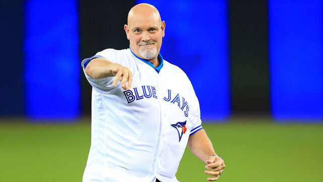 TORONTO, ON - OCTOBER 9: Former MLB player Duane Ward throws out the ceremonial first pitch prior to game three of the American League Division Series between the Texas Rangers and the Toronto Blue Jays at Rogers Centre on October 9, 2016 in Toronto, Canada.