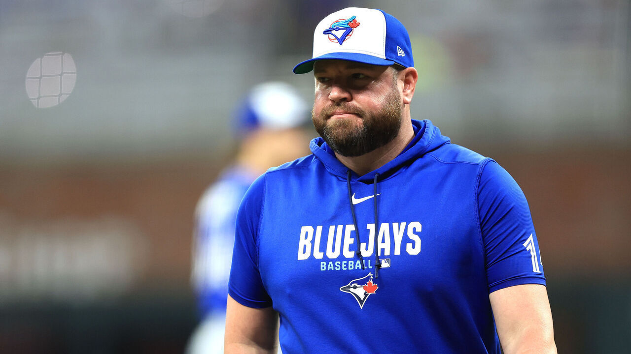 ATLANTA, GA - JUNE 03: John Schneider #14 of the Toronto Blue Jays walks off the field during the MLB game between the Toronto Blue Jays and the Atlanta Braves on June 3,2026 at TRUIST Park in Atlanta,GA.