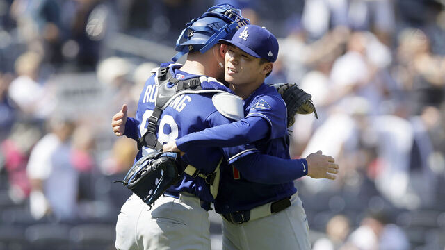 NEW YORK, NEW YORK - JULY 19: Yoshinobu Yamamoto #18 and Dalton Rushing #68 of the Los Angeles Dodgers celebrate after defeating the New York Yankees in game one of a double header at Yankee Stadium on July 19, 2026 in New York City.