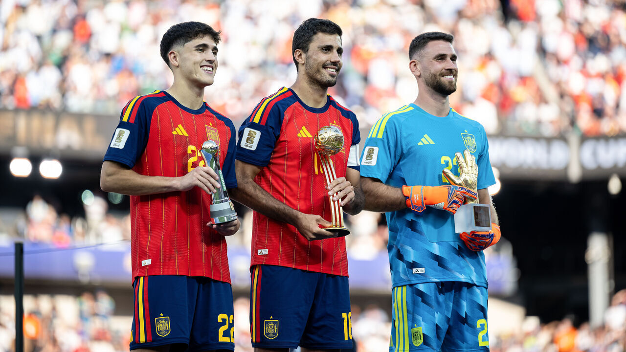 EAST RUTHERFORD, NEW JERSEY - JULY 19: Pau Cubarsi, Rodri and Unai Simon (L-R) presents their awards after the FIFA World Cup 2026 Final match between Spain and Argentina at New York New Jersey Stadium on July 19, 2026 in East Rutherford, New Jersey.