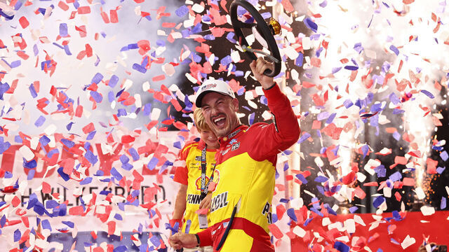 NORTH WILKESBORO, NORTH CAROLINA - JULY 19: Joey Logano, driver of the #22 Shell-Pennzoil Ford, celebrates in the winner's circle after winning the NASCAR Cup Series Window World 450 at North Wilkesboro Speedway on July 19, 2026 in North Wilkesboro, North Carolina.