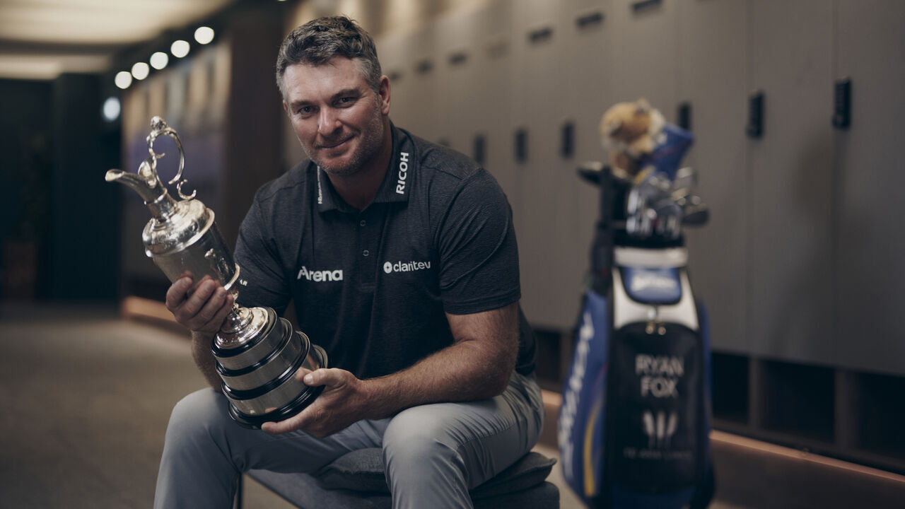 SOUTHPORT, ENGLAND - JULY 19: (EDITORS NOTE: Image has been digitally enhanced.) Champion Golfer, Ryan Fox of New Zealand poses for a photo with the Claret Jug in the locker room following Day Four of the The 154th Open Championship at Royal Birkdale on July 19, 2026 in Southport, England.