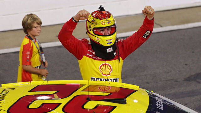 NORTH WILKESBORO, NORTH CAROLINA - JULY 19: Joey Logano, driver of the #22 Shell-Pennzoil Ford, celebrates after winning the NASCAR Cup Series Window World 450 at North Wilkesboro Speedway on July 19, 2026 in North Wilkesboro, North Carolina.