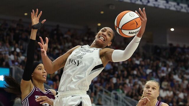 TORONTO, ON - JULY 20 - A'ja Wilson #22 of the Las Vegas Aces hauls in a rebound in front of Isabelle Harrison #21 of the Toronto Tempo as the Toronto Tempo play the Las Vegas Aces at Coca-Cola Coliseum in Toronto. July 20, 2026. Steve Russell/Toronto Star (Steve Russell/Toronto Star via Getty Images)