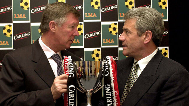 This picture can only be used within the context of an editorial feature. England manager Kevin Keegan presents Manchester United manager Sir Alex Ferguson with the Carling Manager of the Year Award at the League Managers Association Dinner. *..at the De Vere Belton Woods Hotel in Belton nr Grantham.