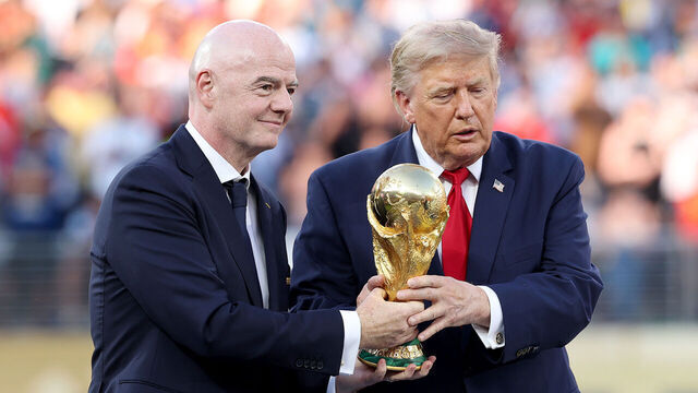EAST RUTHERFORD, NEW JERSEY - JULY 19: U.S. President Donald Trump and FIFA President Gianni Infantino hold the FIFA World Cup Winner's Trophy before handing over to captain Rodri #16 of Spain at the award ceremony following the FIFA World Cup 2026 Final match between Spain and Argentina at New York New Jersey Stadium on July 19, 2026 in East Rutherford, New Jersey.