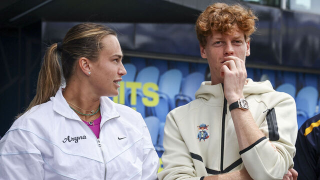 Current Australian Open tennis champions Aryna Sabalenka (L) of Belarus and Italy's Jannik Sinner talk as they wait to participate in an offical ceremony for the main draw, ahead of the Australian Open tennis tournament in Melbourne on January 9, 2025. / -- IMAGE RESTRICTED TO EDITORIAL USE - STRICTLY NO COMMERCIAL USE --