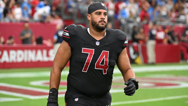 GLENDALE, ARIZONA - SEPTEMBER 22: Isaiah Adams #74 of the Arizona Cardinals runs onto the field prior to a game against the Detroit Lions at State Farm Stadium on September 22, 2024 in Glendale, Arizona.