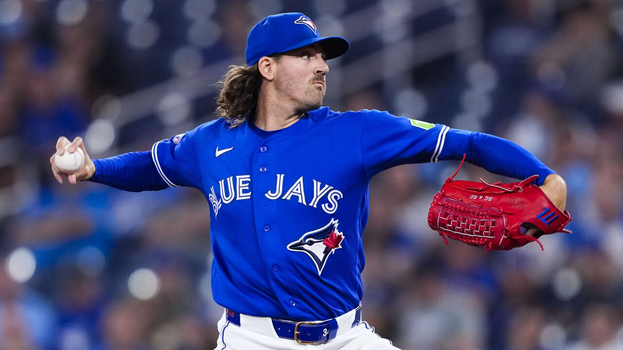 TORONTO, CANADA - JULY 21: Kevin Gausman #34 of the Toronto Blue Jays pitches against the Tampa Bay Rays during the first inning in their MLB game at the Rogers Centre on July 21, 2026 in Toronto, Canada.