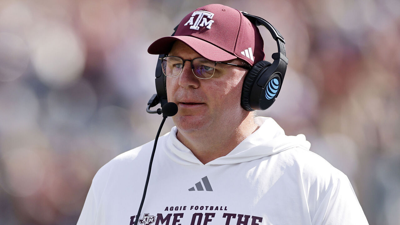 COLLEGE STATION, TX - DECEMBER 20: Head coach Mike Elko of the Texas A&M Aggies looks on during the 2025 College Football Playoff First Round Game against the Miami Hurricanes on December 20, 2025 at Kyle Field in College Station, Texas.