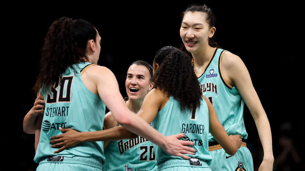 BROOKLYN, NEW YORK - JULY 22: Sabrina Ionescu #20 of the New York Liberty speaks with Breanna Stewart #30, Rebekah Gardner #7, and Han Xu #21 during the third quarter against the Chicago Sky at Barclays Center on July 22, 2026 in Brooklyn, New York.