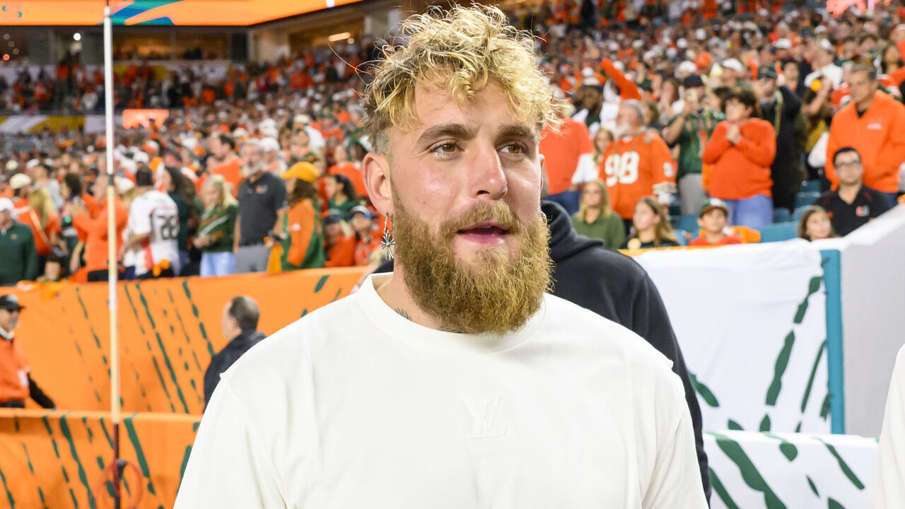 MIAMI GARDENS, FL - JANUARY 19: Jake Paul stands on the sidelines before the Indiana Hoosiers versus the Miami Hurricanes College Football Playoff National Championship Game Presented by AT&T on January 19, 2026, at Hard Rock Stadium in Miami Gardens, FL.