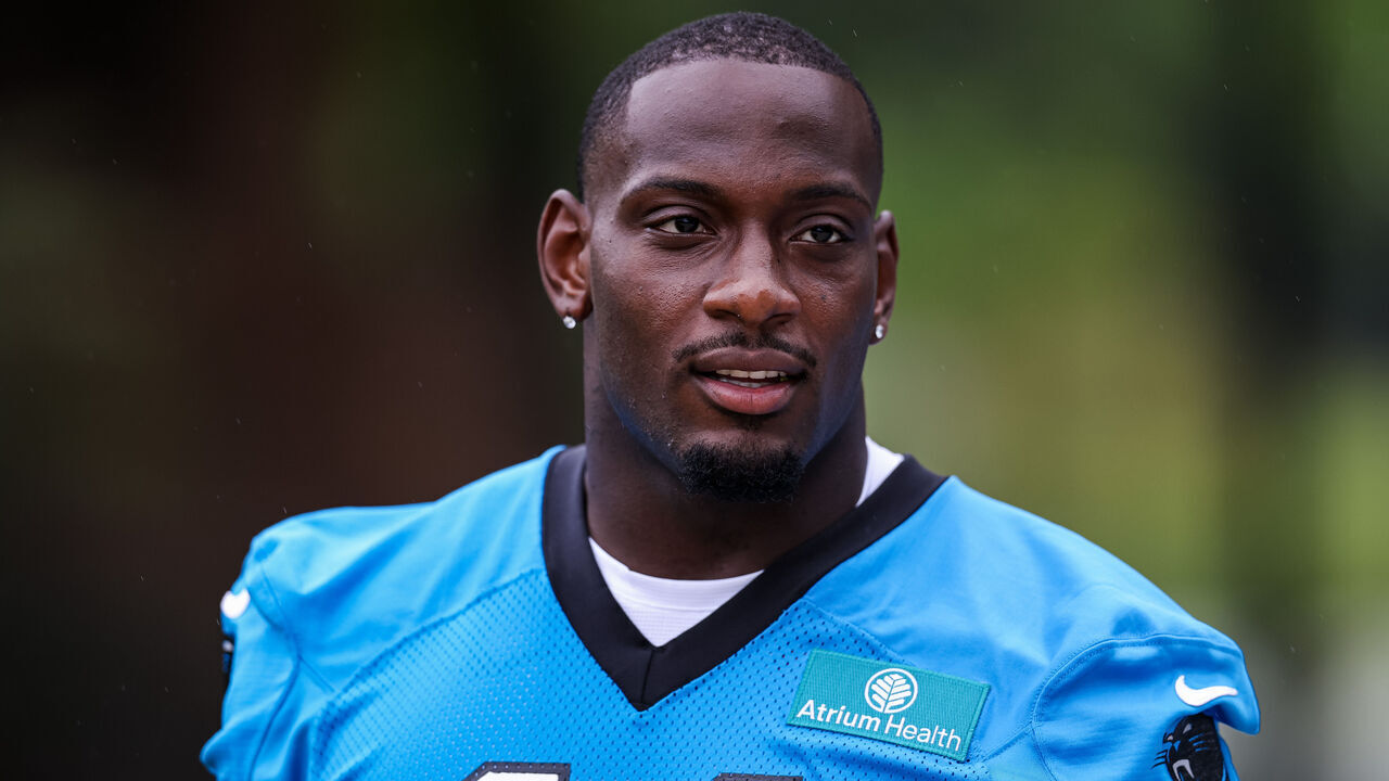 CHARLOTTE, NORTH CAROLINA - JULY 23: Nic Scourton #11 of the Carolina Panthers walks to the field during the Carolina Panthers Training Camp at Carolina Panthers Practice Fields on July 23, 2026 in Charlotte, North Carolina.