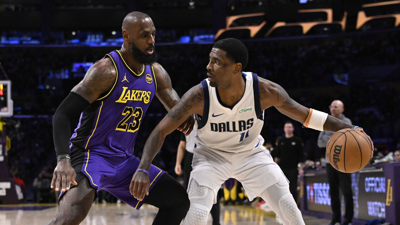 Los Angeles, CA - February 25: Kyrie Irving #11 of the Dallas Mavericks controls the ball against LeBron James #23 of the Los Angeles Lakers in the first half of a NBA basketball game at Crypto.com Arena in Los Angeles on Tuesday, February 25, 2025.