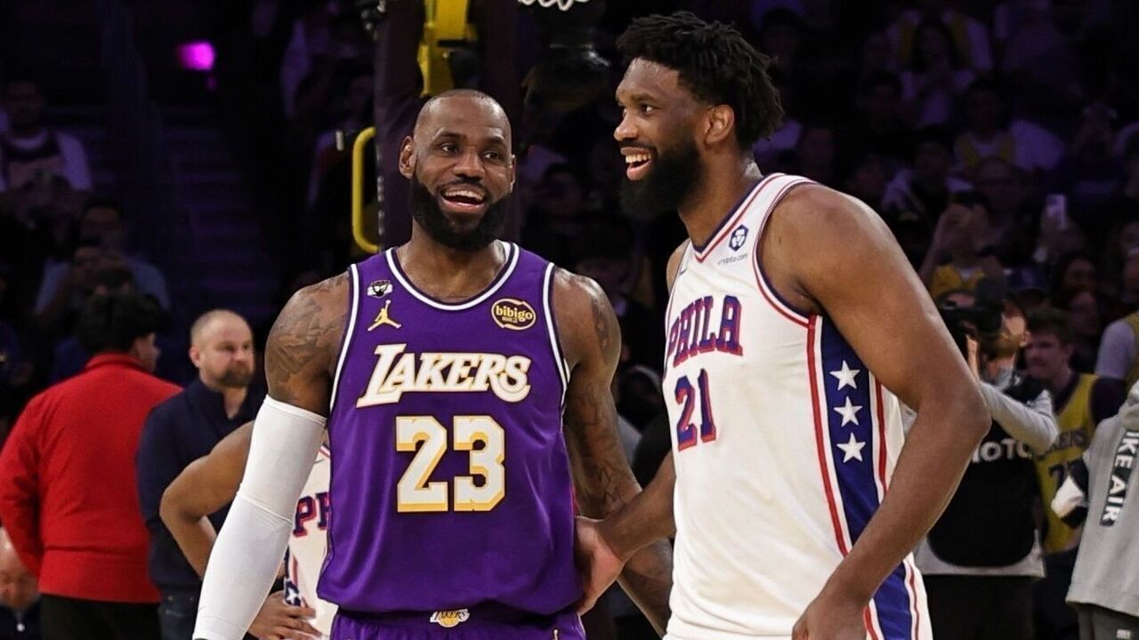 LOS ANGELES, CA - FEBRUARY 5: Joel Embiid #21 of the Philadelphia 76ers and LeBron James #23 of the Los Angeles Lakers smiles before the game on February 5, 2026 at Crypto.Com Arena in Los Angeles, California. NOTE TO USER: User expressly acknowledges and agrees that, by downloading and/or using this Photograph, user is consenting to the terms and conditions of the Getty Images License Agreement. Mandatory Copyright Notice: Copyright 2026 NBAE
