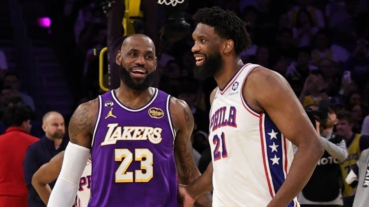 LOS ANGELES, CA - FEBRUARY 5: Joel Embiid #21 of the Philadelphia 76ers and LeBron James #23 of the Los Angeles Lakers smiles before the game on February 5, 2026 at Crypto.Com Arena in Los Angeles, California. NOTE TO USER: User expressly acknowledges and agrees that, by downloading and/or using this Photograph, user is consenting to the terms and conditions of the Getty Images License Agreement. Mandatory Copyright Notice: Copyright 2026 NBAE