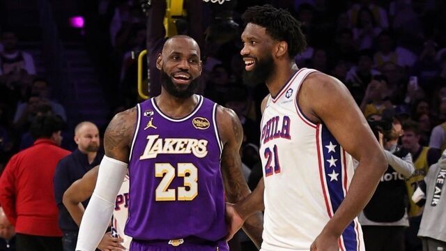 LOS ANGELES, CA - FEBRUARY 5: Joel Embiid #21 of the Philadelphia 76ers and LeBron James #23 of the Los Angeles Lakers smiles before the game on February 5, 2026 at Crypto.Com Arena in Los Angeles, California. NOTE TO USER: User expressly acknowledges and agrees that, by downloading and/or using this Photograph, user is consenting to the terms and conditions of the Getty Images License Agreement. Mandatory Copyright Notice: Copyright 2026 NBAE