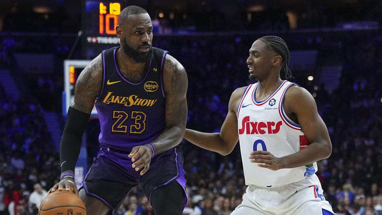 PHILADELPHIA, PENNSYLVANIA - JANUARY 28: LeBron James #23 of the Los Angeles Lakers dribbles the ball against Tyrese Maxey #0 of the Philadelphia 76ers at the Wells Fargo Center on January 28, 2025 in Philadelphia, Pennsylvania. The 76ers defeated the Lakers 118-104. NOTE TO USER: User expressly acknowledges and agrees that, by downloading and/or using this photograph, user is consenting to the terms and conditions of the Getty Images License Agreement.