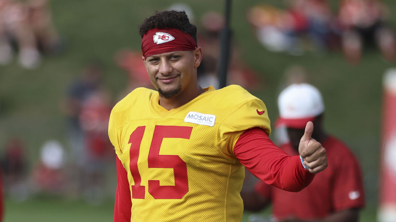 ST. JOSEPH, MO - AUGUST 12: Kansas City Chiefs quarterback Patrick Mahomes (15) smiles and gives the thumbs up to fans during practice at training camp on August 12, 2025 at Missouri Western State University in St. Joseph, MO.