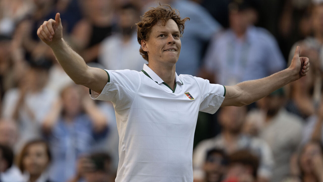 LONDON, ENGLAND - JULY 12: Jannik Sinner celebrates after beating Alexander Zverev in the Men's Singles Final on day fourteen of The Championships Wimbledon 2026 at All England Lawn Tennis and Croquet Club on July 12, 2026 in London, England.