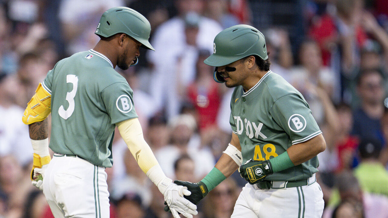 BOSTON, MASSACHUSETTS - JULY 24: Anthony Seigler #48 of the Boston Red Sox reacts with Ceddanne Rafaela #3 of the Boston Red Sox after hitting a home run during the first inning of a game against the Toronto Blue Jays on July 24, 2026 at Fenway Park in Boston, Massachusetts.