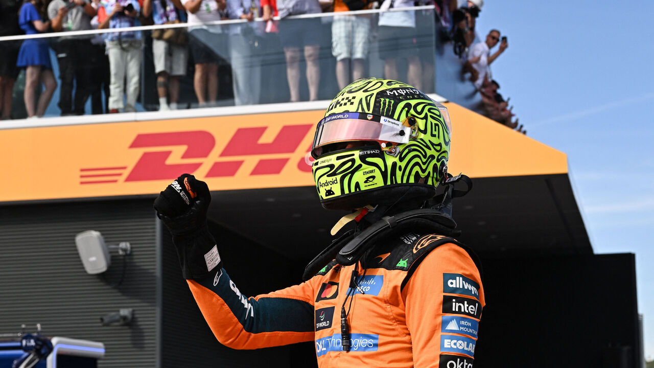 McLaren's British driver Lando Norris celebrates winning the pole position after the qualifying session at the Hungaroring racetrack in Mogyorod near Budapest, Hungary, on July 25, 2026 ahead of the Formula One Hungarian Grand Prix.