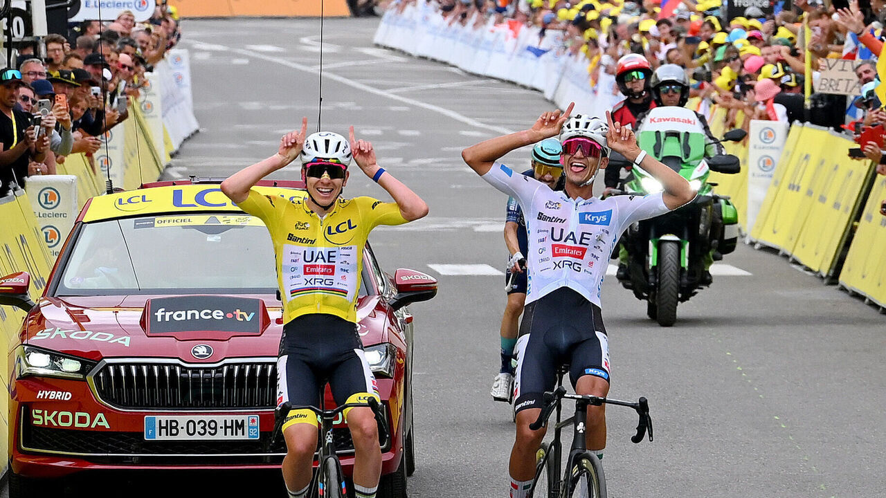 ALPE D'HUEZ, FRANCE - JULY 25: (L-R) The final overall winner, Tadej Pogacar of Slovenia and - Yellow Leader Jersey and Isaac Del Toro of Mexico and UAE Team Emirates - XRG - White best Young Rider Jersey and third place winner celebrate at the finish line during the 113th Tour de France 2026, Stage 20 a 170.9km stage from Le Bourg d'Oisans to Alpe d'Huez 1842m / #UCIWT / on July 25, 2026 in Alpe d'Huez, France.