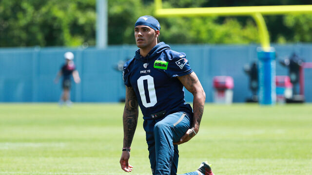 FOXBOROUGH, MA- JUNE 11: Christian Gonzalez #0 of the New England Patriots stretches during New England Patriots Minicamp on June 11, 2026, at Gillette Stadium in Foxborough, Massachusetts.
