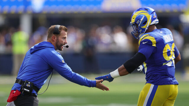INGLEWOOD, CALIFORNIA - OCTOBER 15: Los Angeles Rams head coach Sean McVay high fives Aaron Donald #99 of the Los Angeles Rams during the second quarter against the Arizona Cardinals at SoFi Stadium on October 15, 2023 in Inglewood, California.
