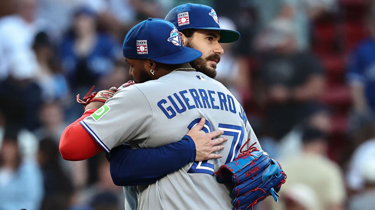 BOSTON, MA - JULY 25: Pitcher Dylan Cease #84 of the Toronto Blue Jays gets a hug from Vladimir Guerrero Jr. #27 after the final out of his complete game one hitter in their 6-0 win over the Boston Red Sox at Fenway Park on July 25, 2026 in Boston, Massachusetts.
