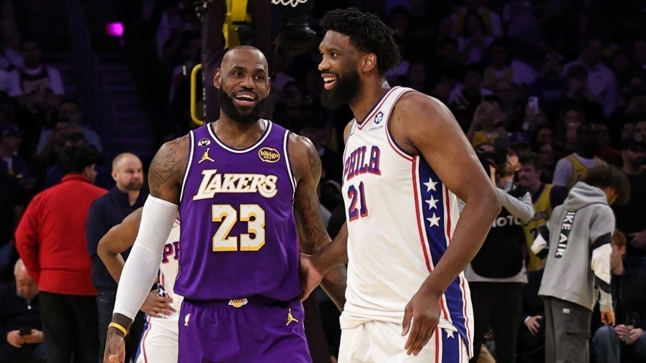 LOS ANGELES, CA - FEBRUARY 5: Joel Embiid #21 of the Philadelphia 76ers and LeBron James #23 of the Los Angeles Lakers smiles before the game on February 5, 2026 at Crypto.Com Arena in Los Angeles, California. NOTE TO USER: User expressly acknowledges and agrees that, by downloading and/or using this Photograph, user is consenting to the terms and conditions of the Getty Images License Agreement. Mandatory Copyright Notice: Copyright 2026 NBAE