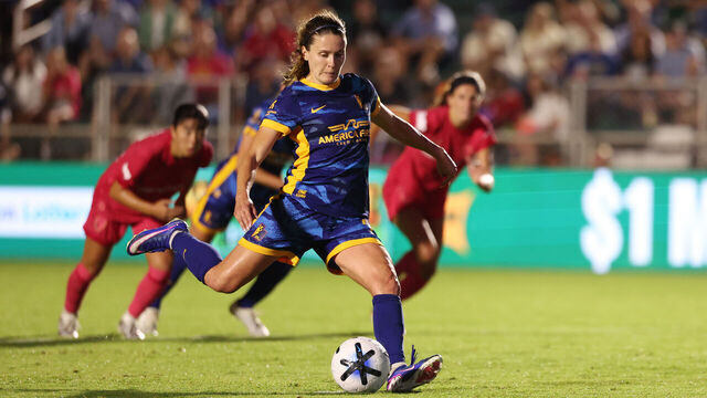 CARY, NORTH CAROLINA - JULY 25: Cloe Lacasse #24 of Utah Royals takes a penalty and scores the team's fourth goal during the NWSL match between North Carolina Courage and Utah Royals at First Horizon Stadium on July 25, 2026 in Cary, North Carolina.