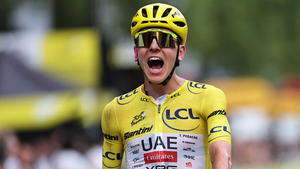 UAE Team Emirates - XRG's Slovenian rider Tadej Pogacar celebrates his overall victory as he crosses the finish line of the 21st stage of the 113th edition of the Tour de France cycling race, 88,7 km starting and finishing in Paris, on July 26, 2026.