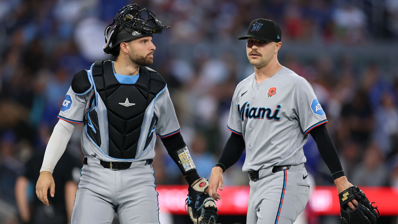 TORONTO, ON - MAY 25: Joe Mack #80 and Janson Junk #26 of the Miami Marlins leave the field during the game between the Miami Marlins and the Toronto Blue Jays at Rogers Centre on Monday, May 25, 2026 in Toronto, Ontario, Canada.