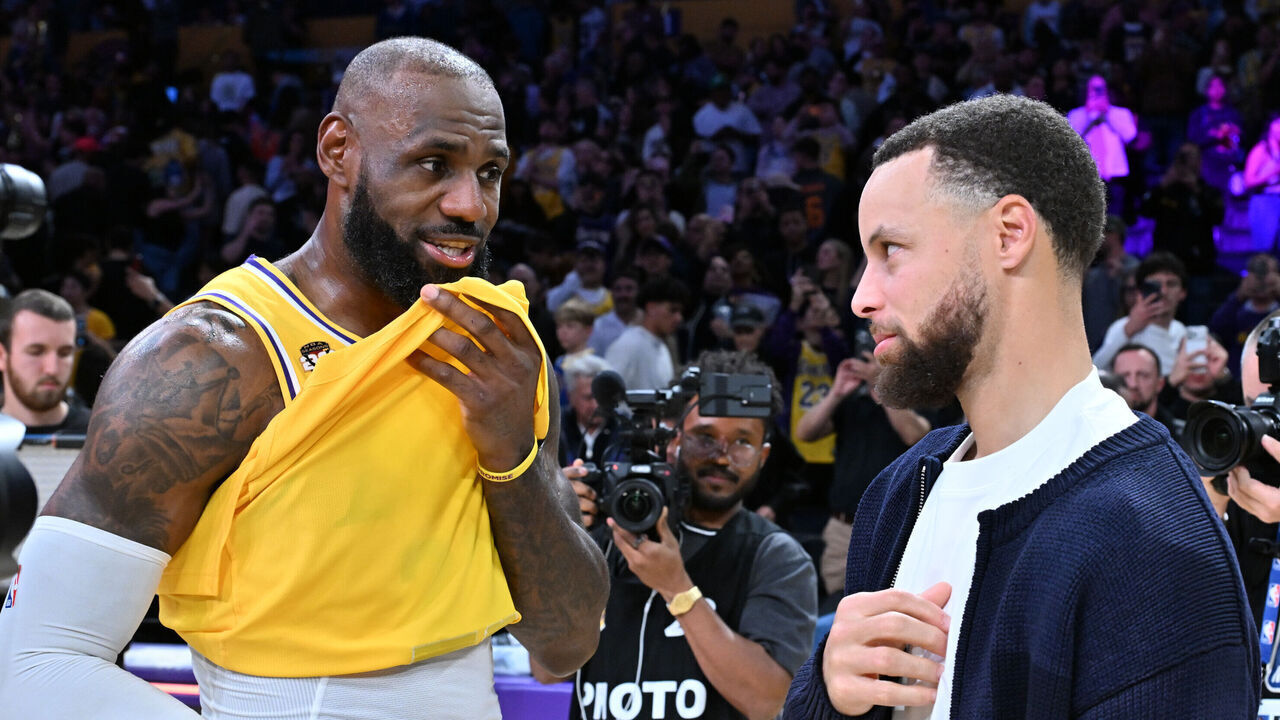 LOS ANGELES, CALIFORNIA - FEBRUARY 07: LeBron James speaks with Stephen Curry following a basketball game between the Los Angeles Lakers and the Golden State Warriors at Crypto.com Arena on February 07, 2026 in Los Angeles, California.