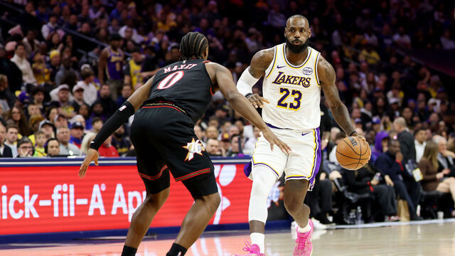 PHILADELPHIA, PENNSYLVANIA - DECEMBER 07: Lebron James #23 of the Los Angeles Lakers drive against Tyrese Maxey #0 of the Philadelphia 76ers during the second half at Xfinity Mobile Arena on December 07, 2025 in Philadelphia, Pennsylvania.