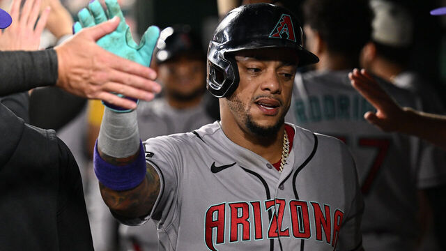 WASHINGTON, DC - JULY 24: Ketel Marte #4 of the Arizona Diamondbacks celebrates in the dugout after scoring the go-ahead run in the seventh inning against the Washington Nationals at Nationals Park on July 24, 2026 in Washington, DC.