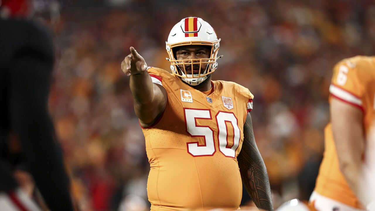 TAMPA, FLORIDA - DECEMBER 11: Vita Vea #50 of the Tampa Bay Buccaneers points before a play during the first quarter of the NFL game against the Atlanta Falcons at Raymond James Stadium on December 11, 2025 in Tampa, Florida.